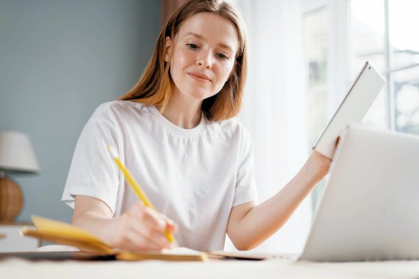 woman-studying-online-at-home-on-the-school-websit-2023-11-27-05-32-27-utc (1)